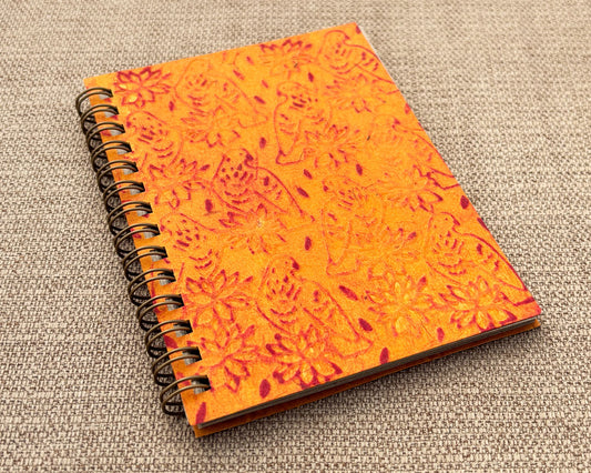 Small embossed notebook Orange Birds