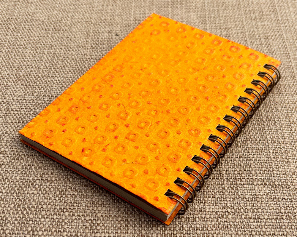 Small embossed notebook Orange Spotty