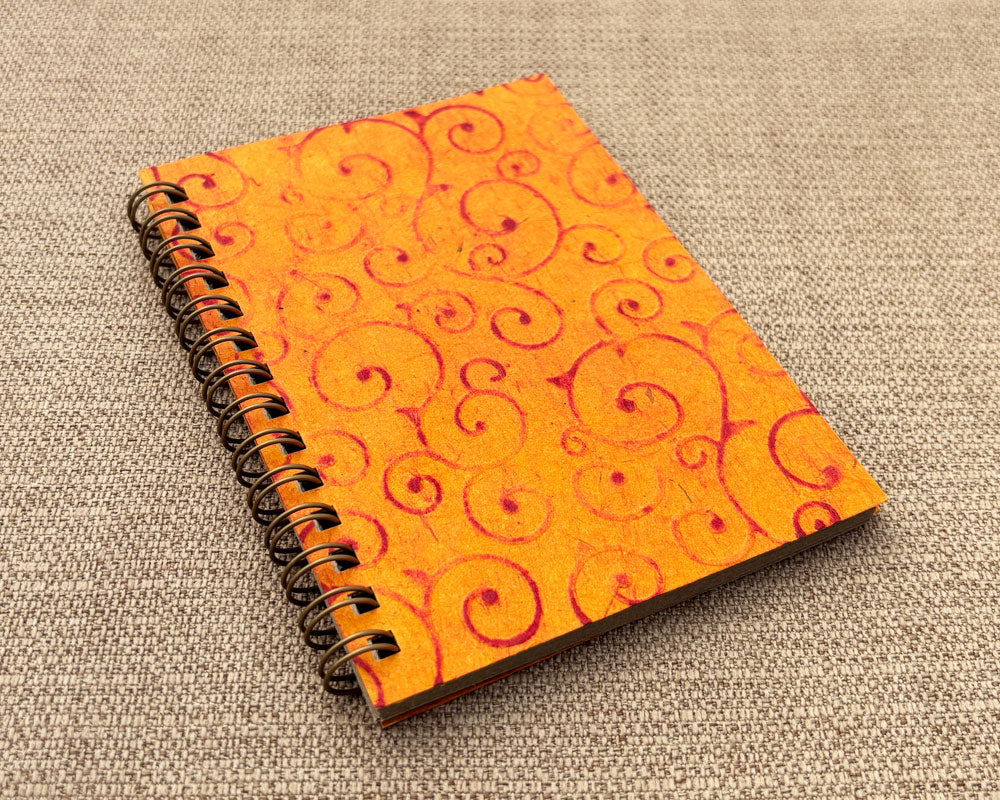 Small embossed notebook Orange Swirl