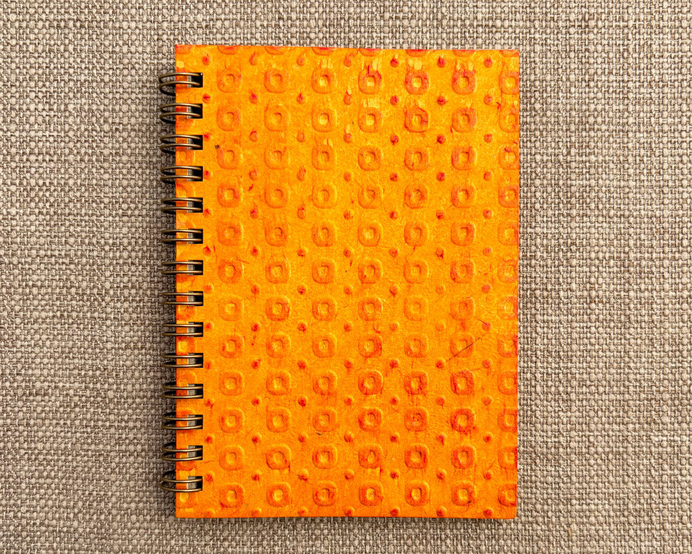 Small embossed notebook Orange Spotty