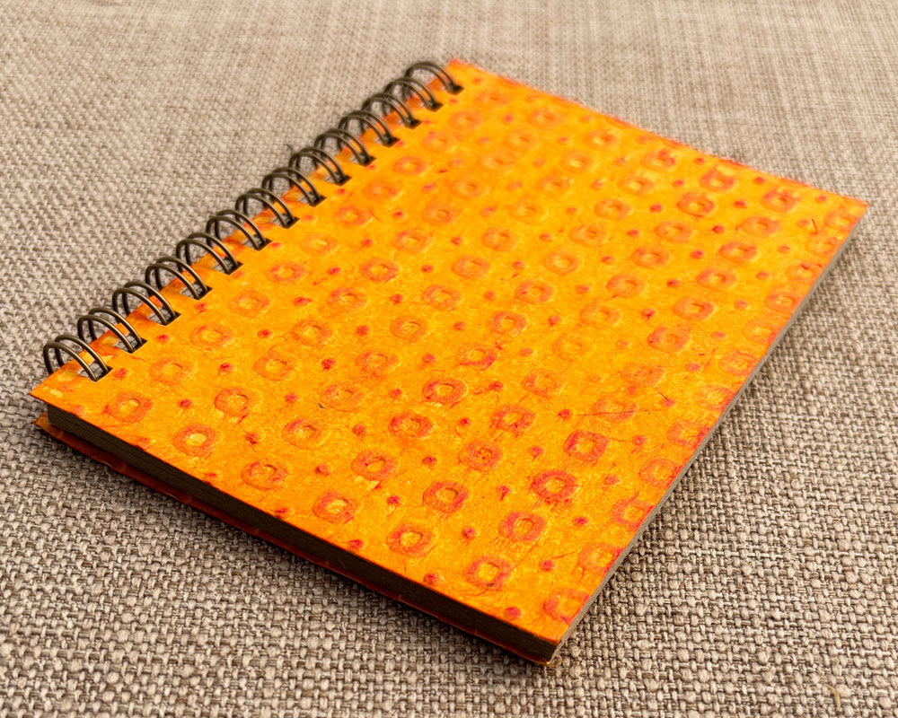 Small embossed notebook Orange Spotty